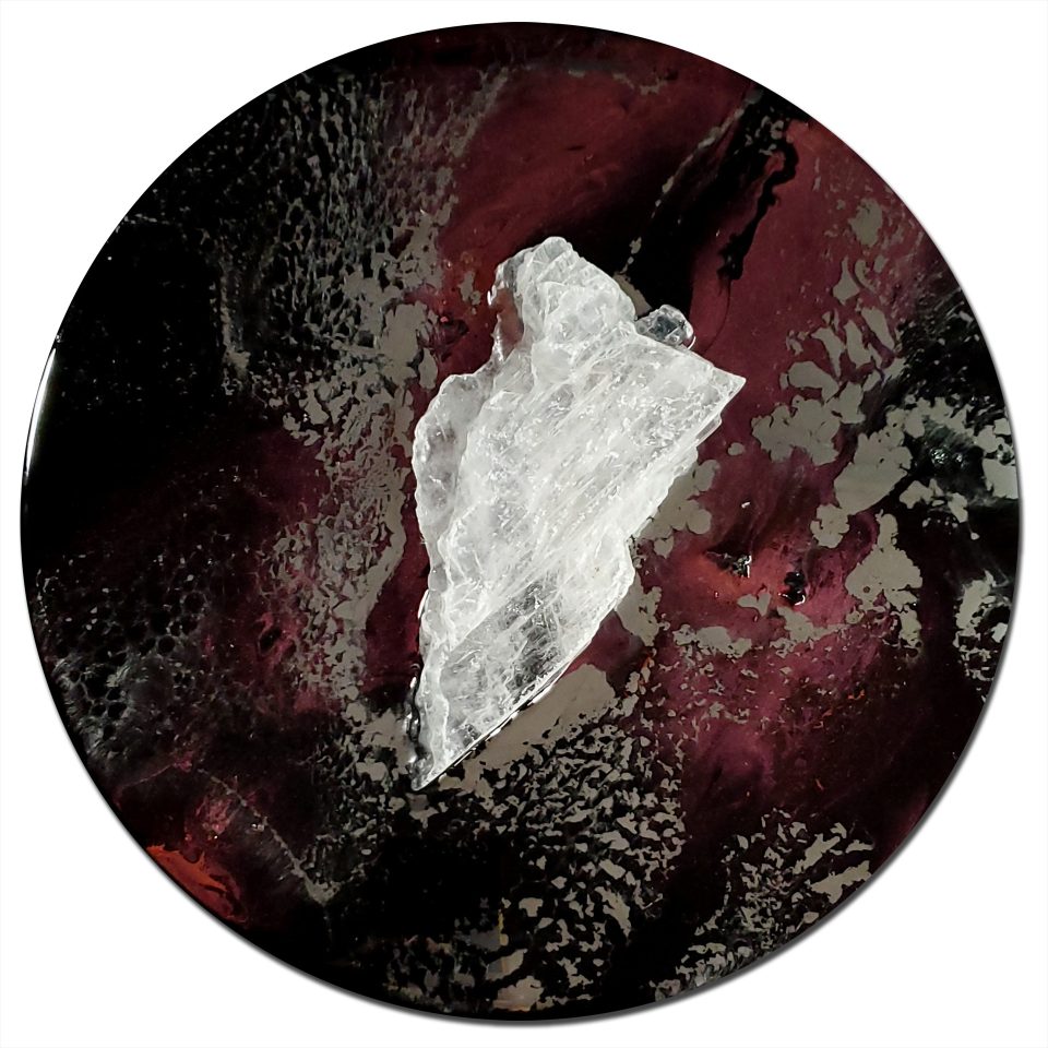 Pure selenite ice crystal artwork 'Elemental 135' with cherry blossom metallic ink and liquid chrome on black circular panel, honoring Earth's elemental forces by artist Aaron K Metz