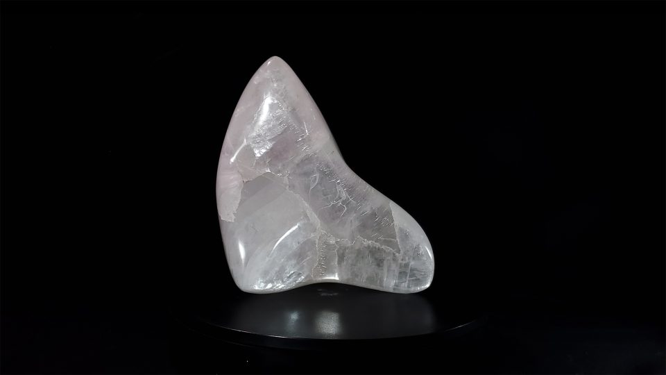 Pristine Arcturius selenite crystal sculpture with exceptional quartz-like clarity and elegant flowing curves featuring a dynamic pointed form hand-carved from rare selenite crystal by Aaron K Metz