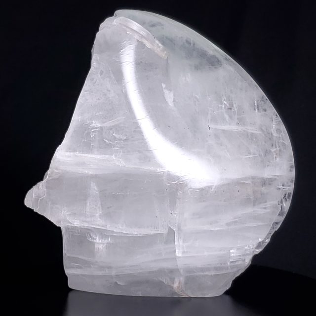 Pristine Fertility 2 selenite crystal sculpture with exceptional ice-like clarity and translucency featuring a vertical, tapered form hand-carved from rare selenite crystal by Aaron K Metz