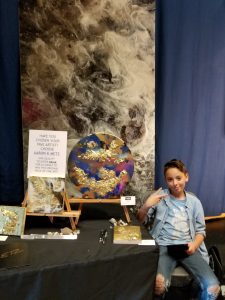Crystal-infused cosmic artwork by Aaron K. Metz at Lake Country ArtWalk 2018 featuring selenite on wood
